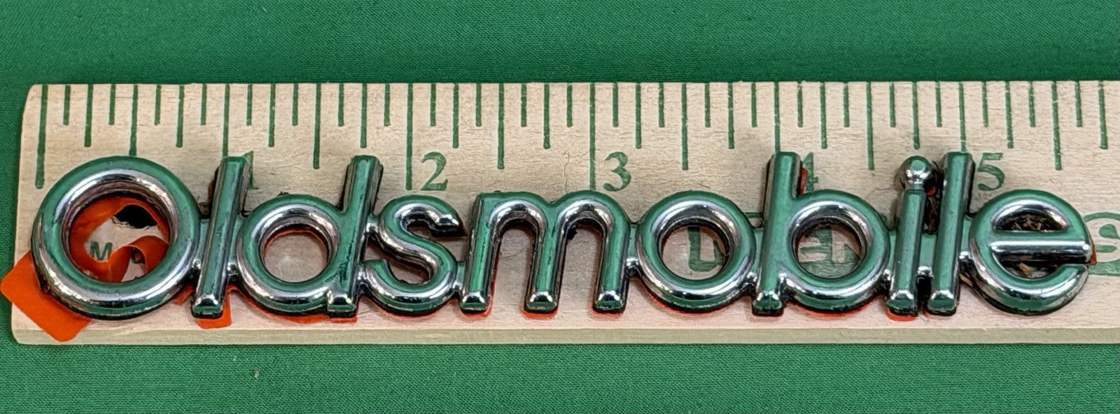 NOS Oldsmobile Nameplate Emblem Adhesive Mount GM 20000969 / 555735–Bundle of 2
