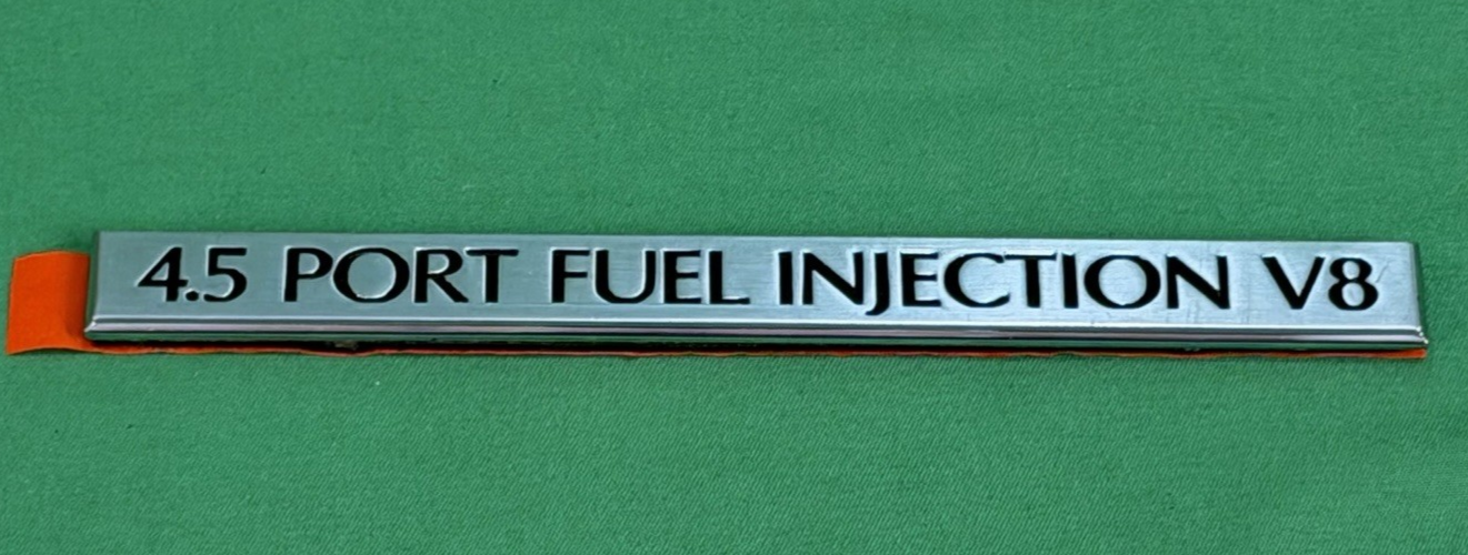 NOS 4.5 Port Fuel Injection V8 Emblem GM 25541014 – Silver - Cadillac