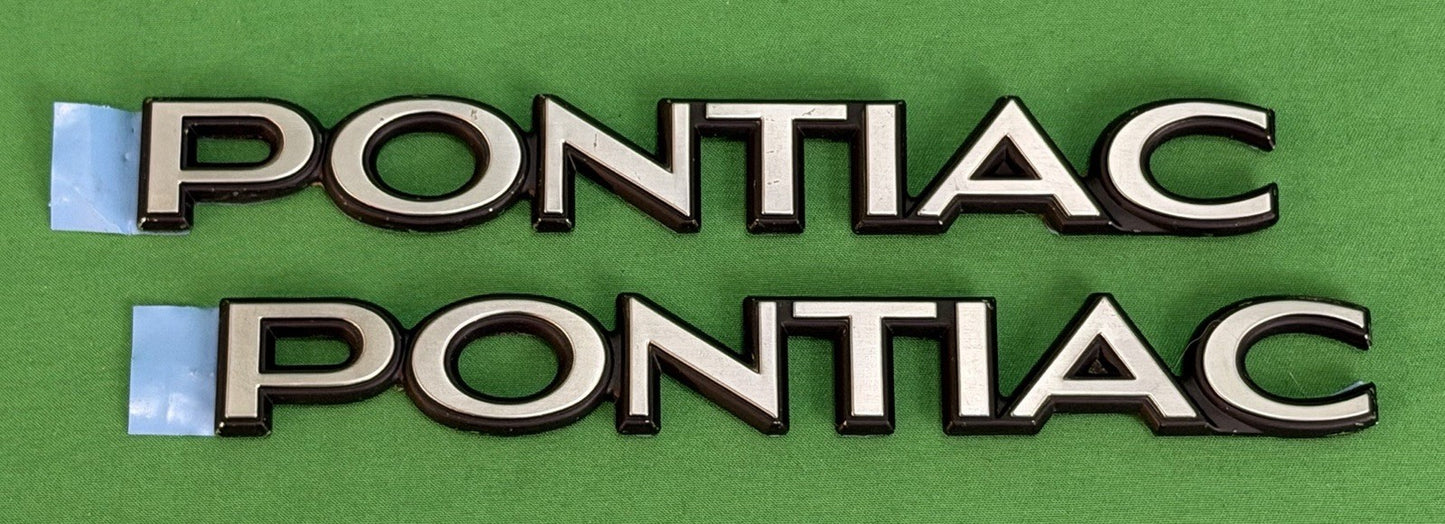 NOS Pontiac Metal Nameplate / Emblem - Adhesive Mount - 6 5/8" – Bundle of 2