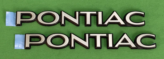 NOS Pontiac Metal Nameplate / Emblem - Adhesive Mount - 6 5/8" – Bundle of 2