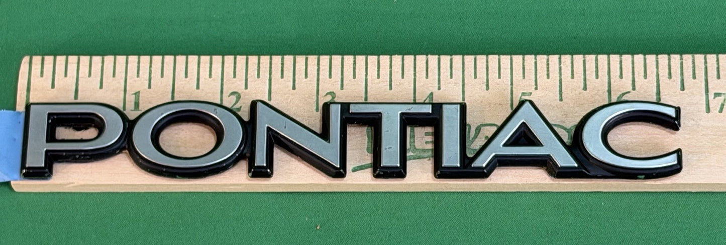 NOS Pontiac Metal Nameplate / Emblem - Adhesive Mount - 6 5/8" – Bundle of 2