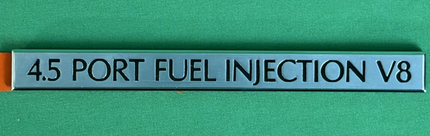 NOS 4.5 Port Fuel Injection V8 Emblem GM 25541014 – Silver - Cadillac