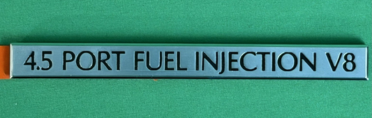 NOS 4.5 Port Fuel Injection V8 Emblem GM 25541014 – Silver - Cadillac