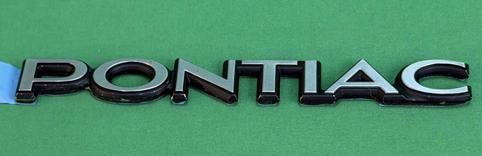 NOS Pontiac Metal Nameplate / Emblem - Adhesive Mount - 6 5/8" – Bundle of 2