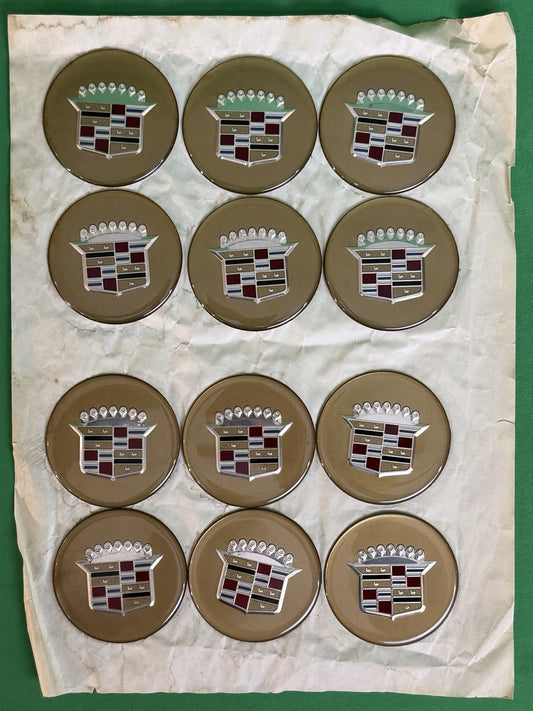Sheet of 12 Cadillac Gold Crest Wheel Center Cap Medallions / Hubcap Emblems-NOS